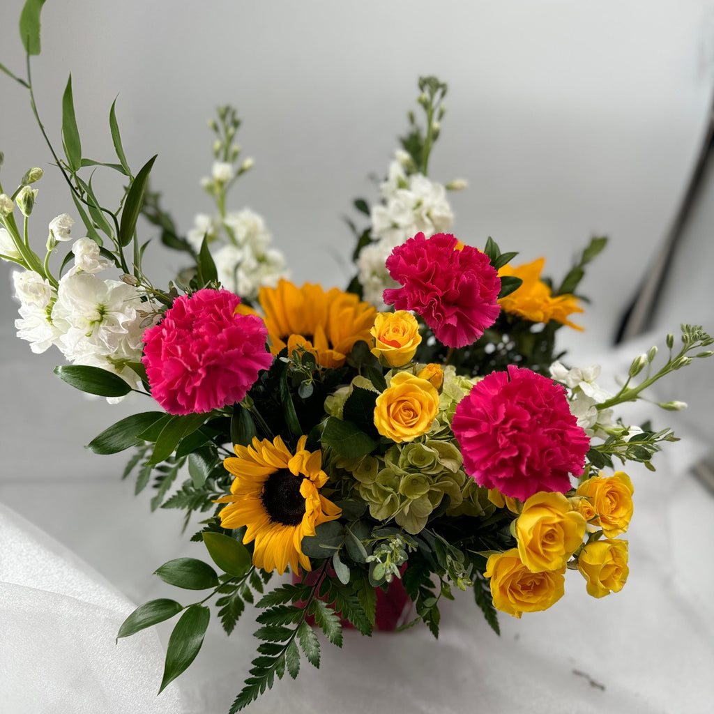 Sunburst Symphony: Vibrant Red Cube Flower Arrangement