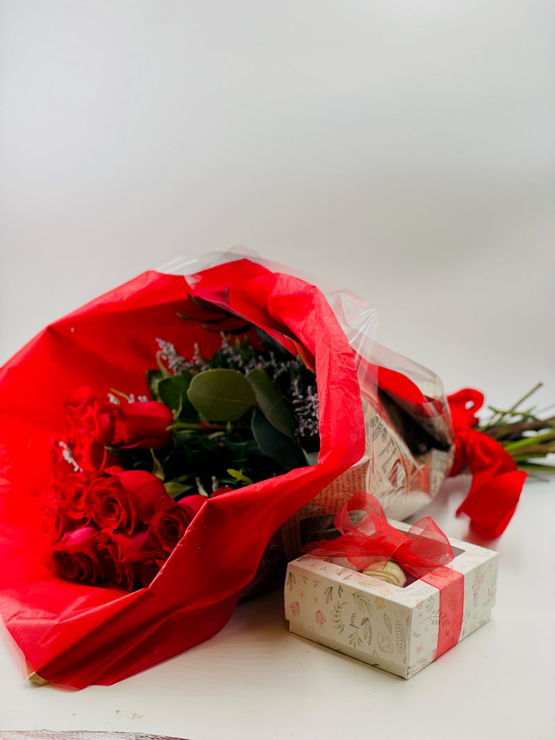Dozen Long Stem Red Roses wrapped  With Box of Chocolate